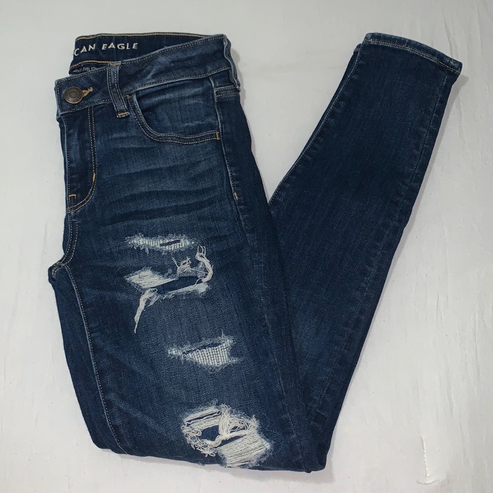 American Eagle Jegging next level stretch w Rips that’re covered under Size 4